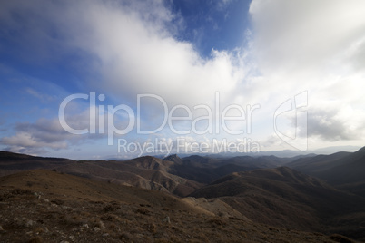 mountains and blue sky with clouds