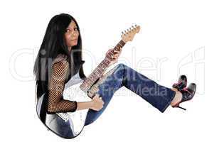 girl with guitar sitting.