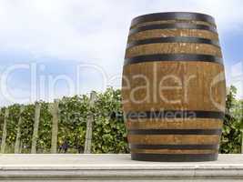 wine barrel in front of the vineyard