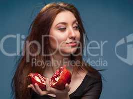 portrait  young girl with pomegranate
