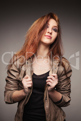 girl in a leather jacket represents model
