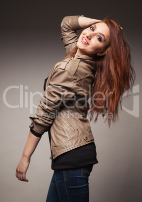 girl in a leather jacket represents model