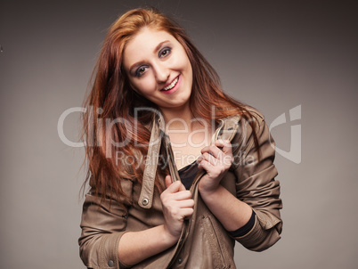 girl in a leather jacket represents model