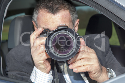 man photographed from the car