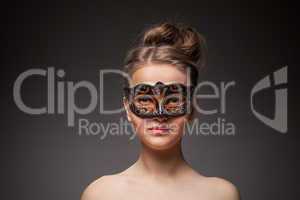 girl in masquerade mask