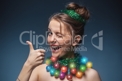 portrait of the young girl who have put on instead of a beads a