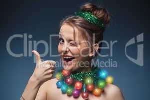 portrait of the young girl who have put on instead of a beads a