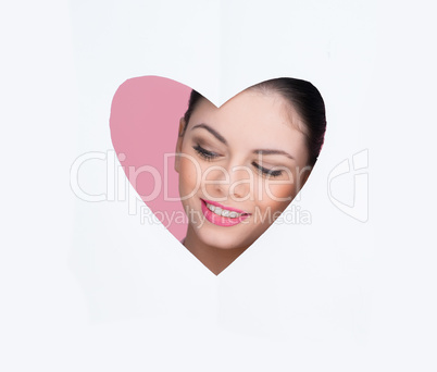beautiful woman in a heart cutout