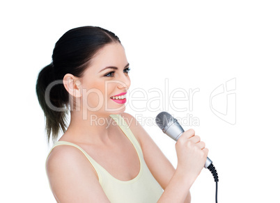 beautiful young woman holding a microphone