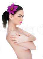 pretty naked woman with a flower in her hair