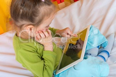 small girls with tablet