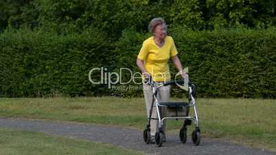 pensioner walk and watch with rollator 11082