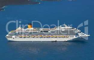 cruise ship near volcano on island of Santorini