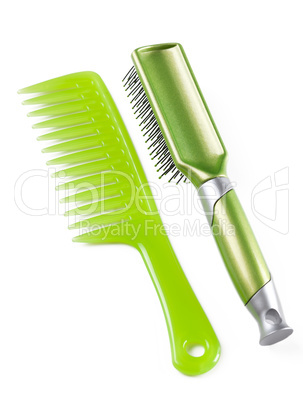 Green plastic comb and hairbrush