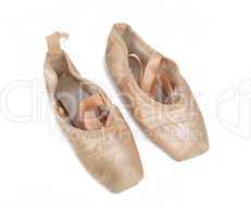 Old used pink ballet shoes