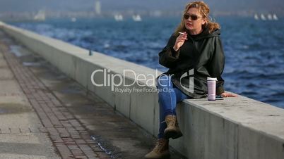 lonely blonde women smoke and drinking