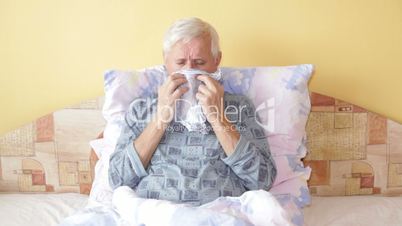 Sick senior man coughing