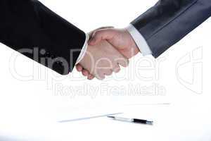 signing of the agreement and a handshake
