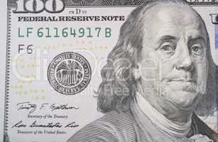 macro shot of the half of the new 100 usa dollar bill