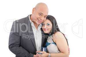 happy couple holding a box with a ring isolated