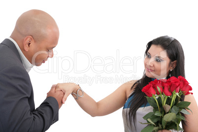 man ready to give a kiss in hand to his wife.  focus in the woma