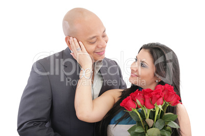 happy woman receiving a bouquet of red roses of her lover