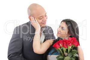 happy woman receiving a bouquet of red roses of her lover