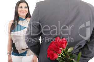 man with a bouquet of red roses watching his woman isolated, val