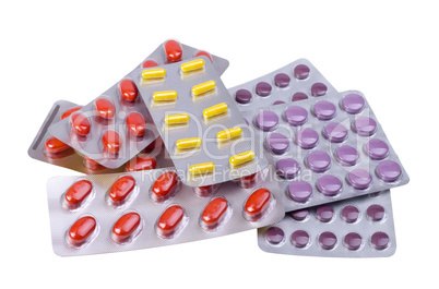 medicine pills and capsules packed in blisters