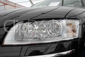The right headlight of the modern automobile