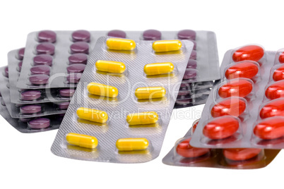 medicine pills and capsules packed in blisters