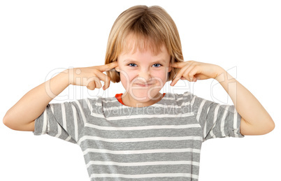 girl with fingers in ears