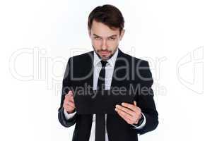 businessman looking at the tablet