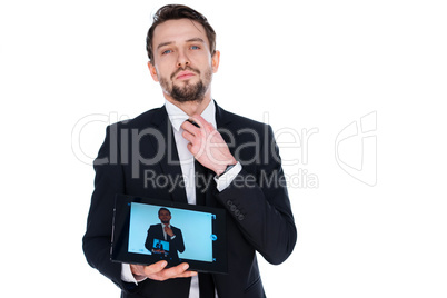 man displaying a handheld tablet computer