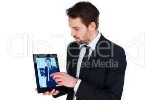 man displaying a handheld tablet computer