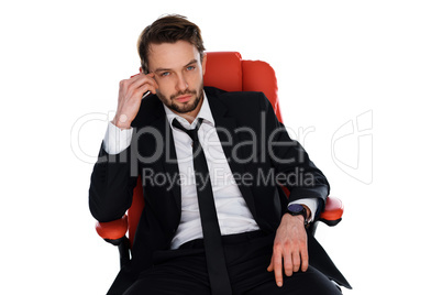 worried businessman chatting on his mobile worried businessman chatting on his mobile