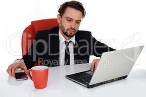 young businessman working on his laptop