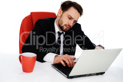 young businessman working on his laptop