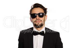 cool macho businessman in sunglasses
