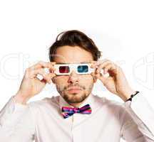 serious young man wearing 3d glasses