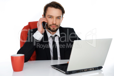 businessman taking a call on his mobile phone