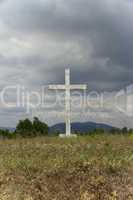 old cross in the field.