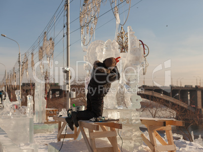 festival "magic ice of siberia", participants create sculptures