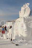 festival "magic ice of siberia",sculptor creates a sculpture fr