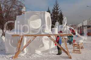 festival "magic ice of siberia", participants create sculptures