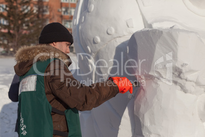 festival "magic ice of siberia", participants create sculptures