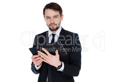 young businessman holding tablet