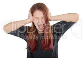 girl closing her ears and screaming
