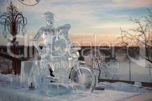 Don Quixote and it squire on a bicycle, a sculpture from ice