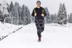man in winter jogging
